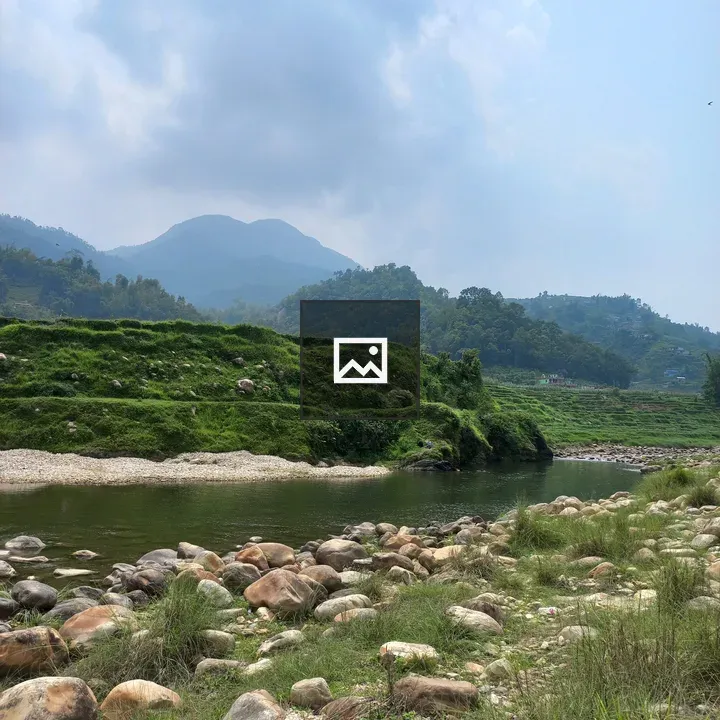 River Through Rocky Shore