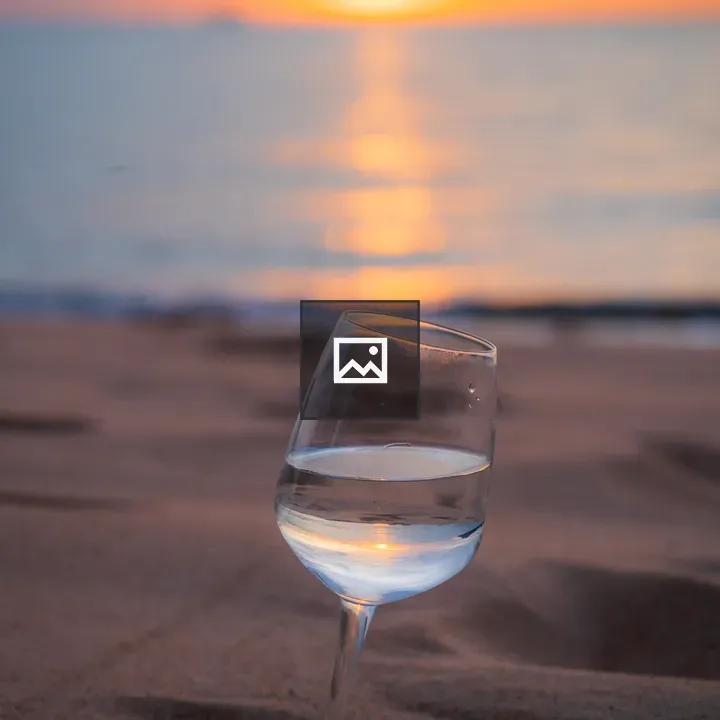 Glass on the beach at sunset