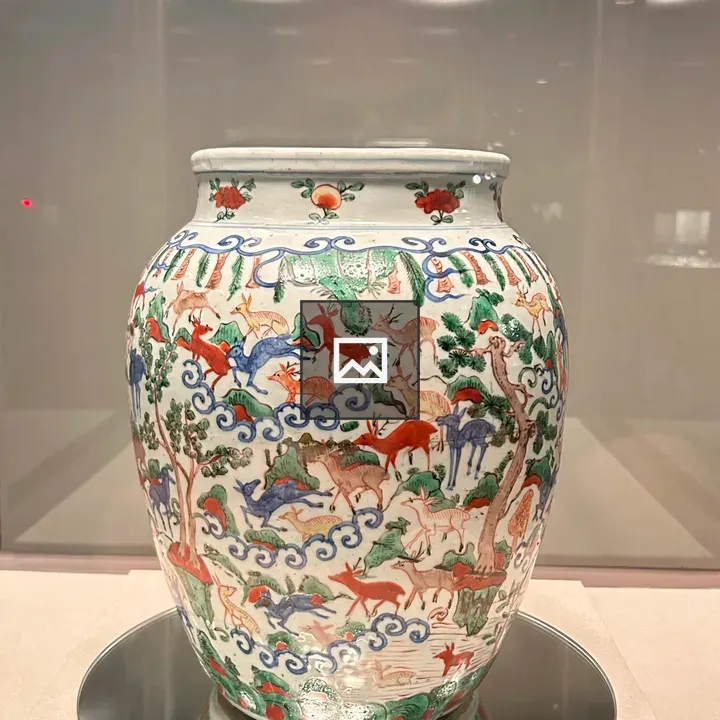 Decorative ceramic jar with deer illustration