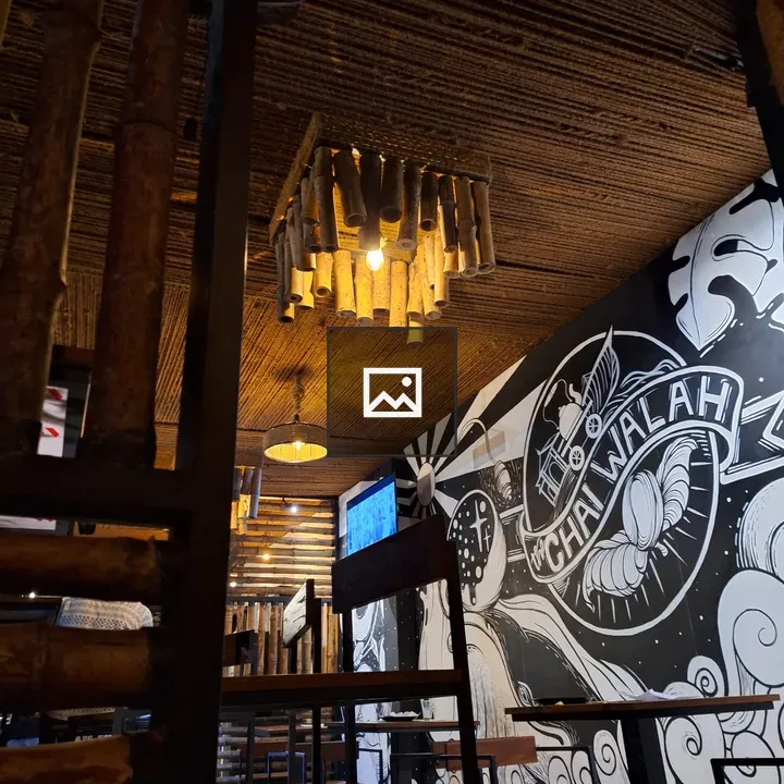 Inside a chai shop with mural