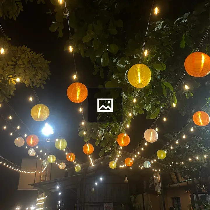 Night scene with lanterns and leaves