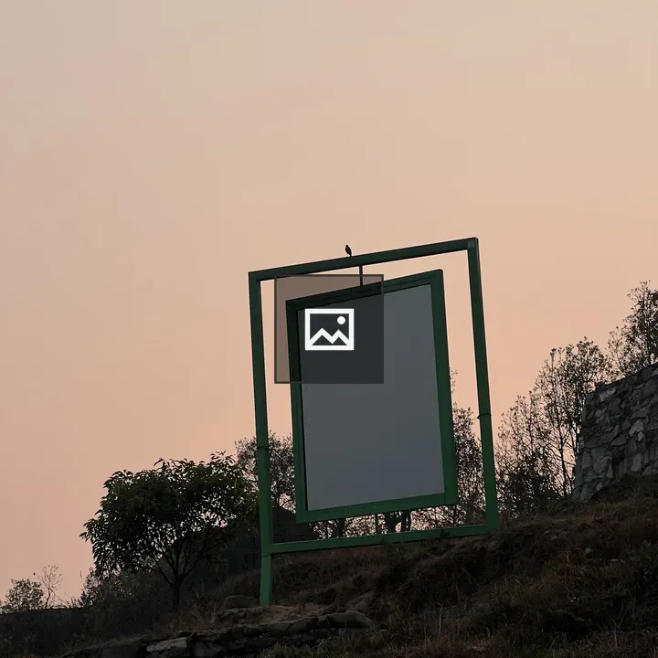 Green frame on grassy slope