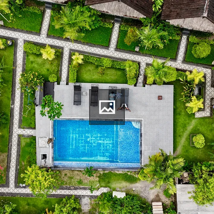 Aerial View of Tropical Cottage Pool