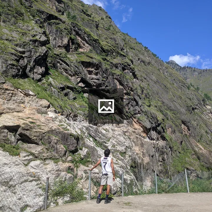 Person at rocky cliff edge