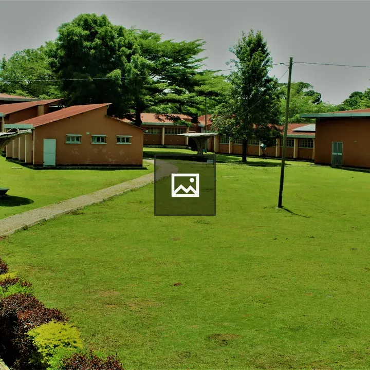 A landscaped area with orange buildings
