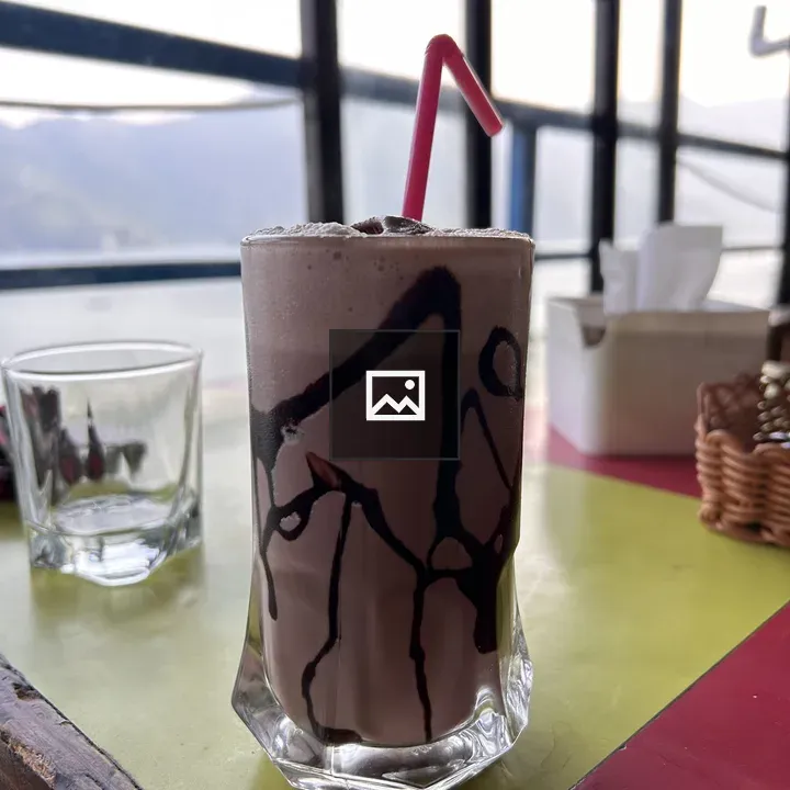Chocolate milk shake in cup