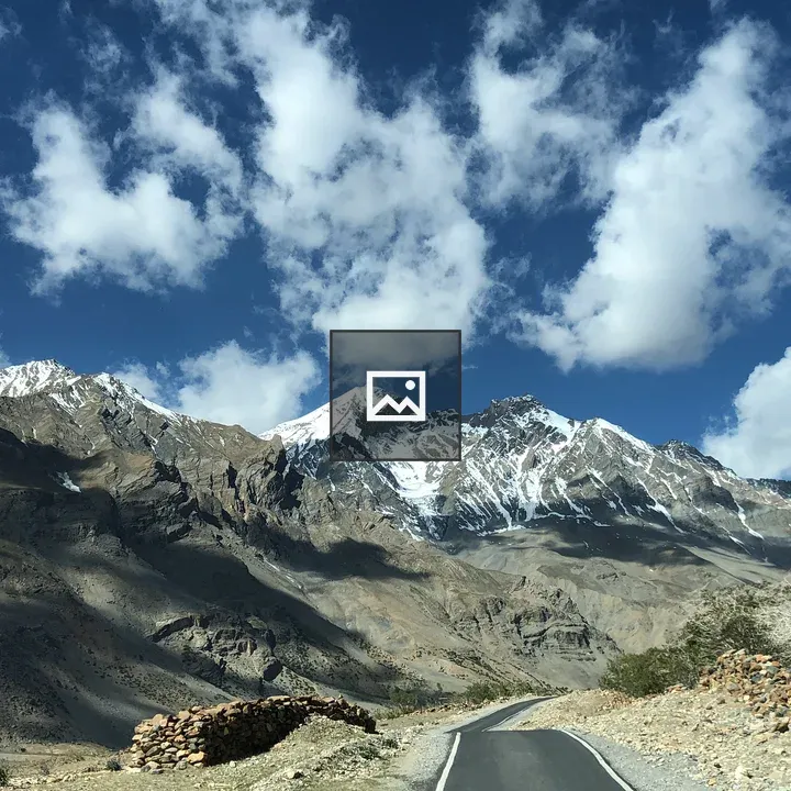 Mountains with road and clouds