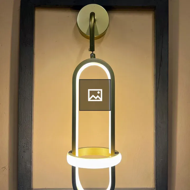 Oval wall sconce with LED glow