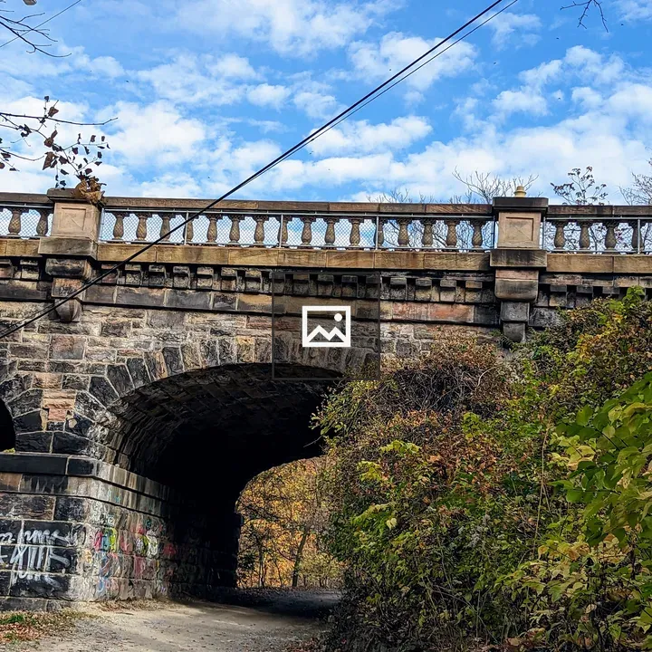 Path Under Stone Bridge Arch