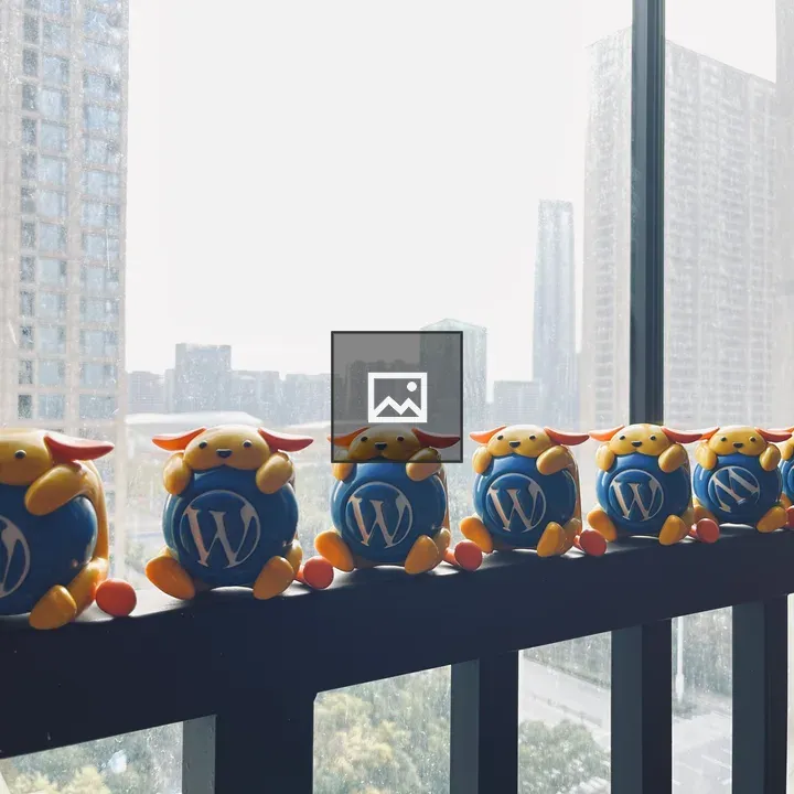 Wapuu toys on railing