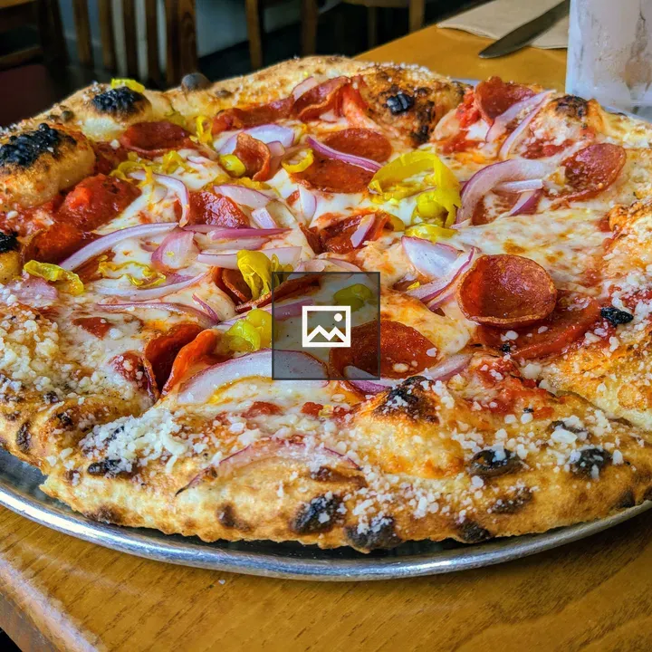 Wood-fired pepperoni pizza