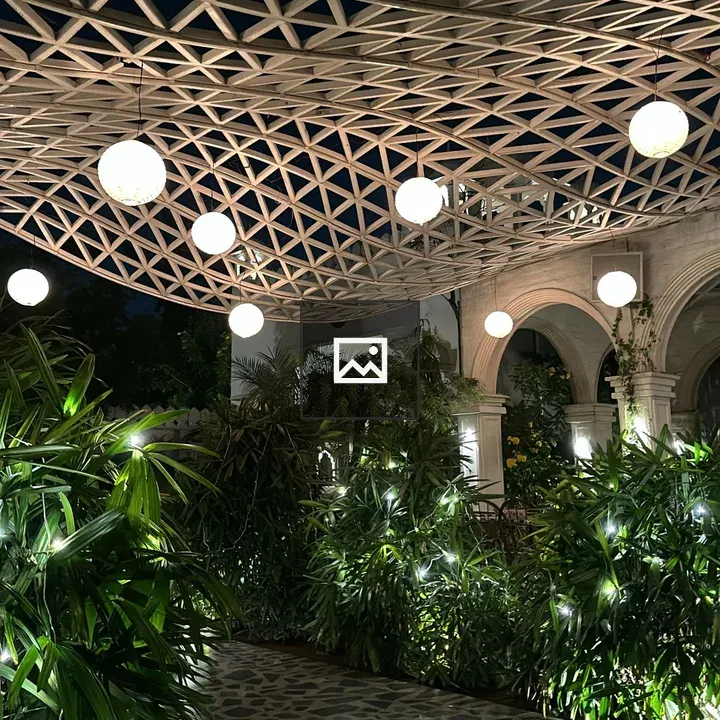 Geometric lattice roof at night