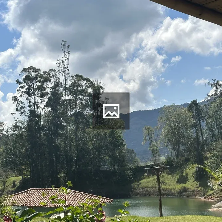 Serene lake landscape with greenery