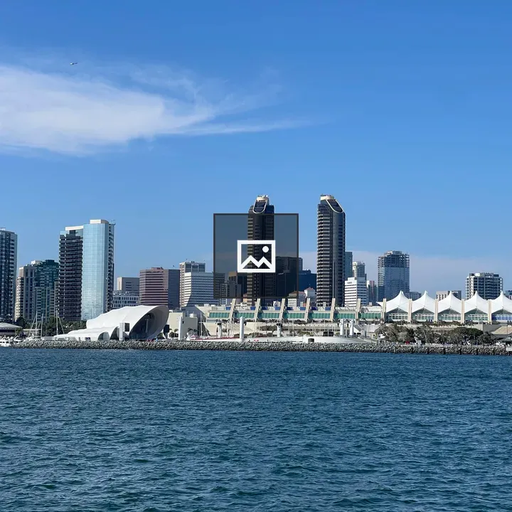 City skyscrapers by harbor