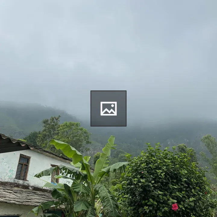 Rural house with greenery and hills