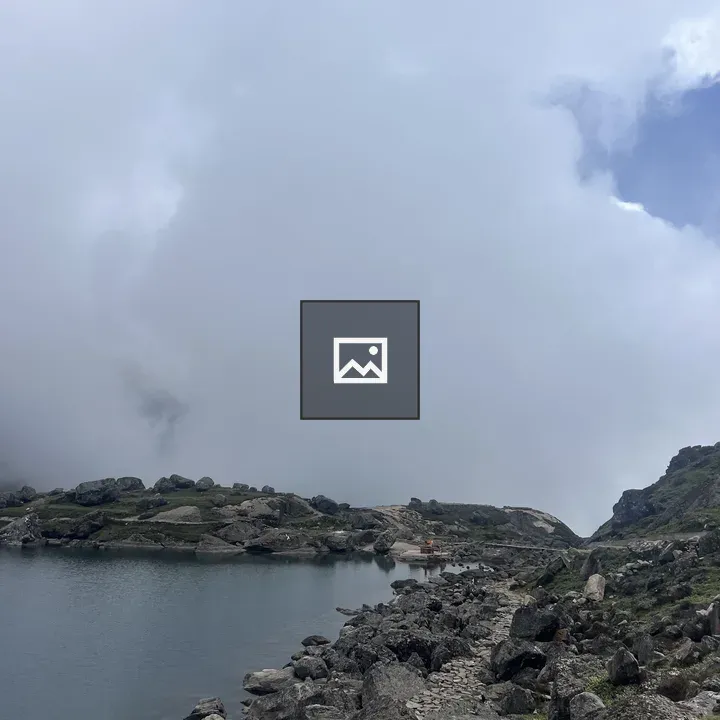Serene lake with rocky shoreline