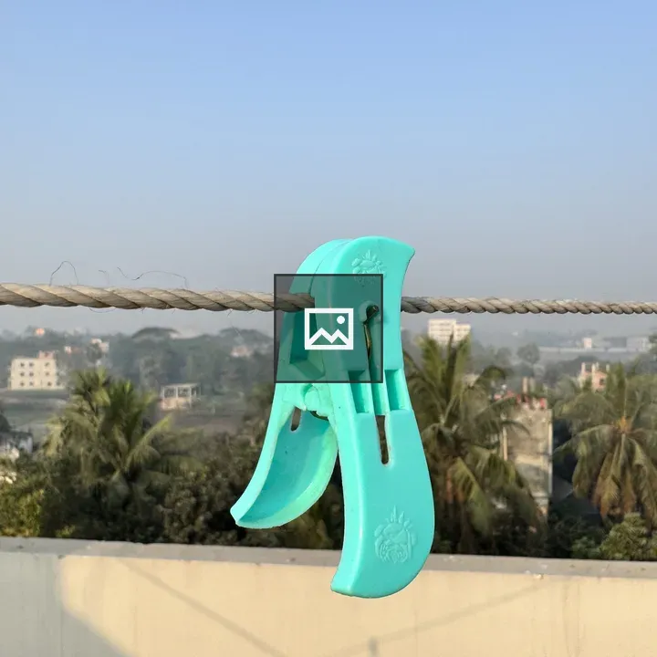 Turquoise Clothespin on Rope