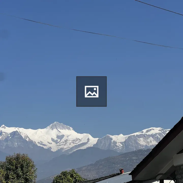 Snow-capped mountains with blue sky