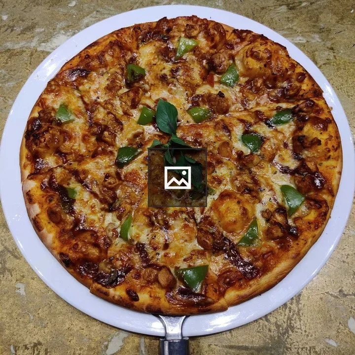 Pizza on White Plate