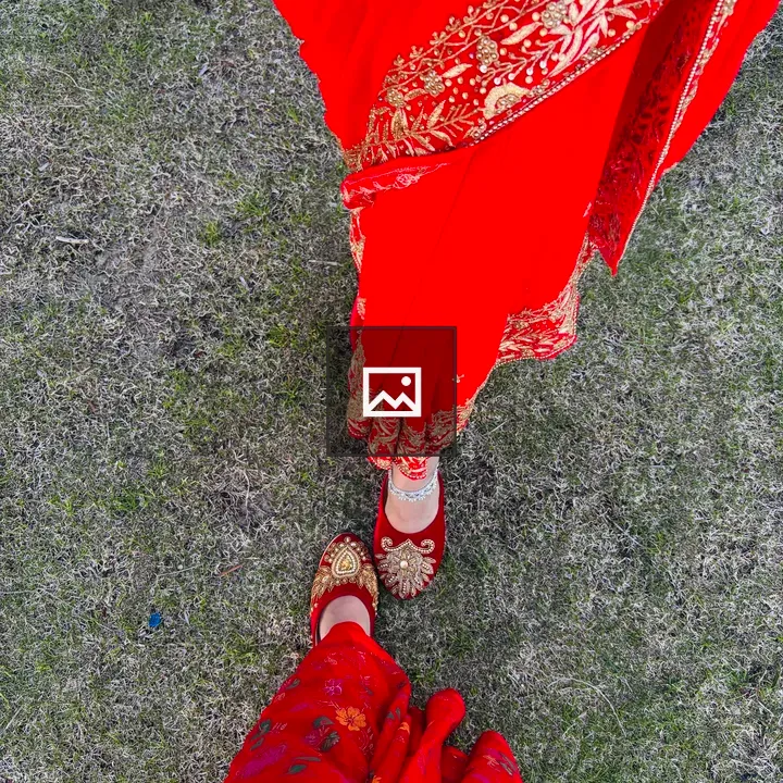 Two Women in Red Sarees