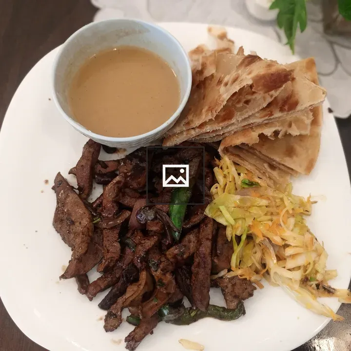Plate with chapati and meat