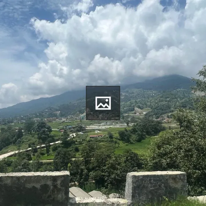 Panoramic hills and fields with stone structures