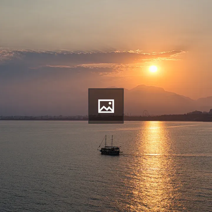 Sunset Sailboat Over Sea