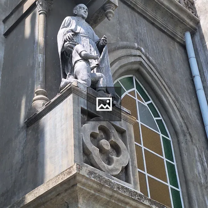 Stone sculpture on building exterior