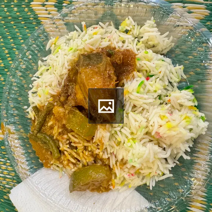 Plate of rice with chicken curry