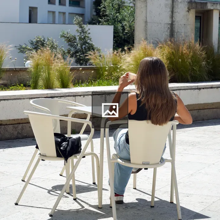 Person Outdoors Sipping Drink