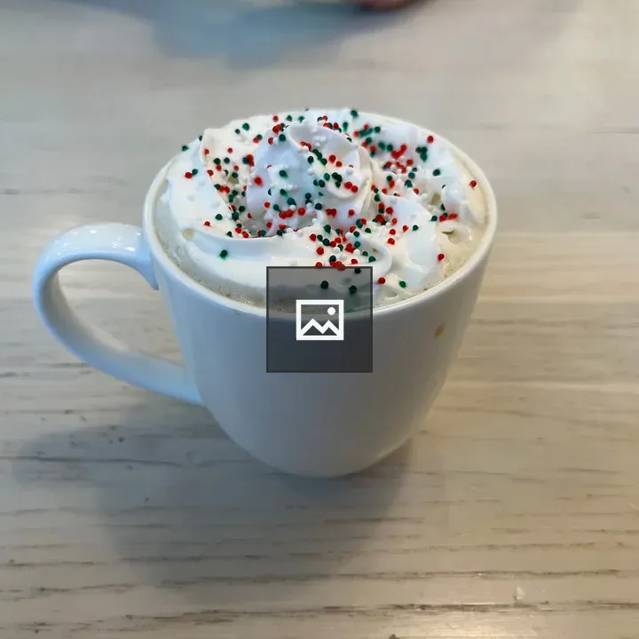 Drink in a mug with whipped cream