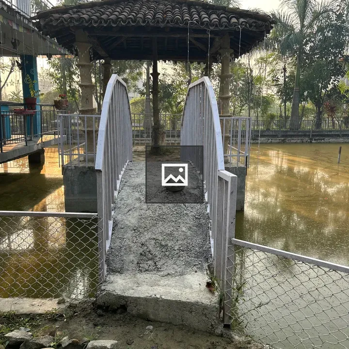 Arched footbridge to gazebo