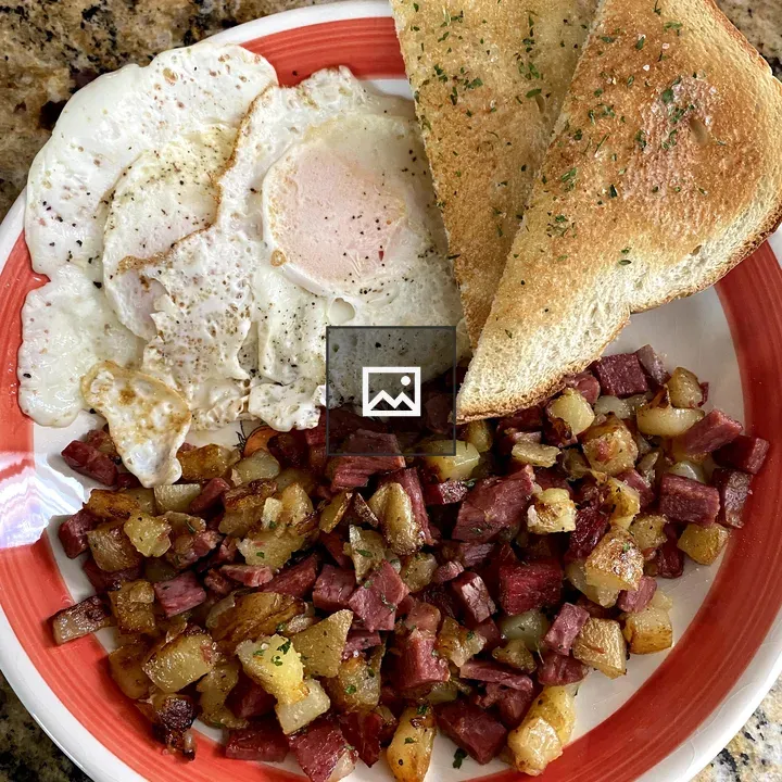Homemade corned beef hash with eggs