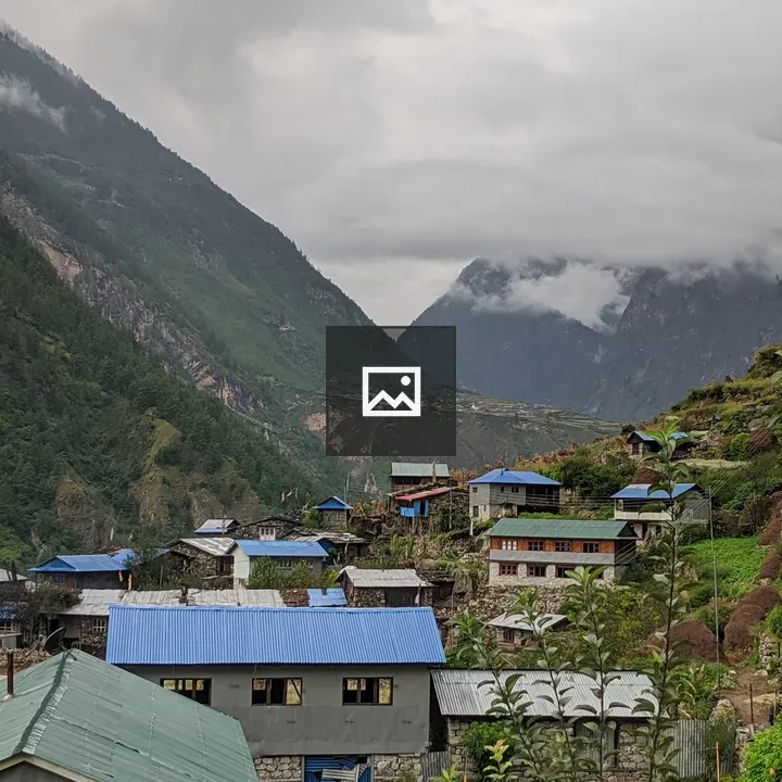 Village in valley mountainside