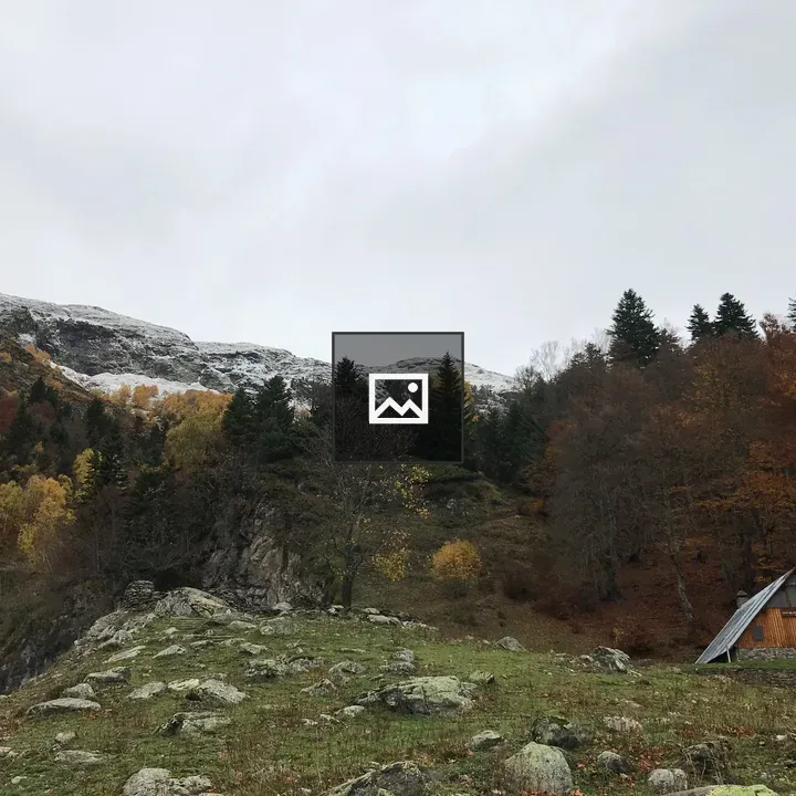 Wooden cabin in winter mountains