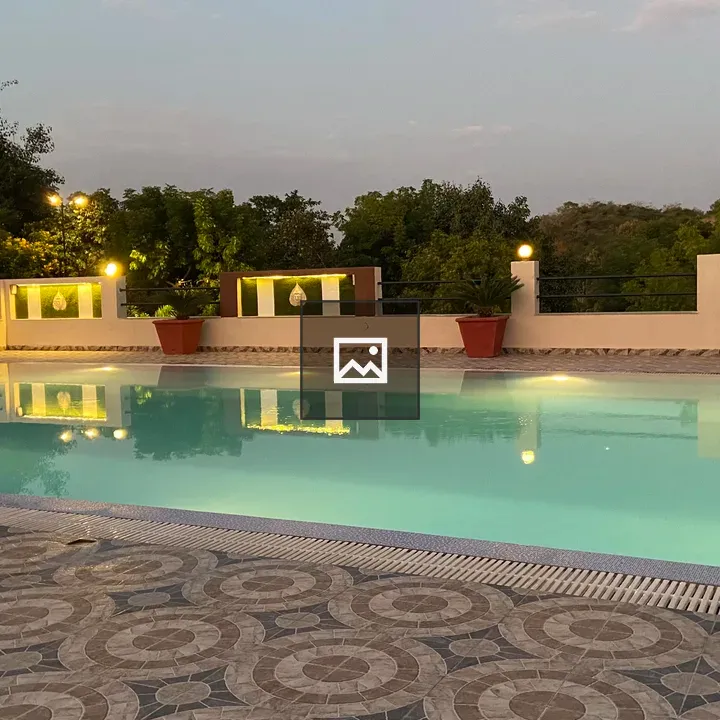 Outdoor pool with tiled deck