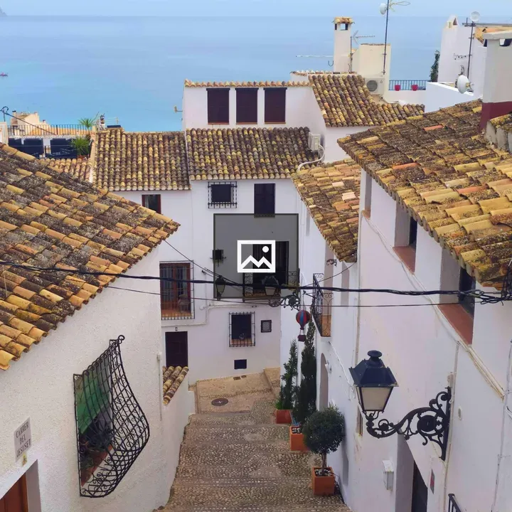 White-washed House on Cobbled Streets