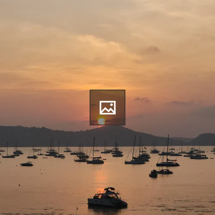 Sunrise with Boats at Shore