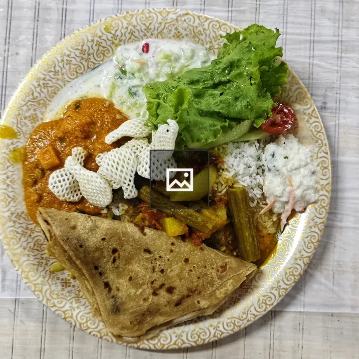 Round Plate with Indian Dishes