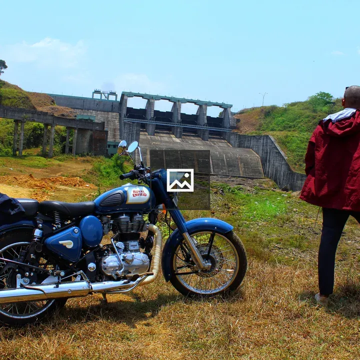 Motorcycle Near a Dam