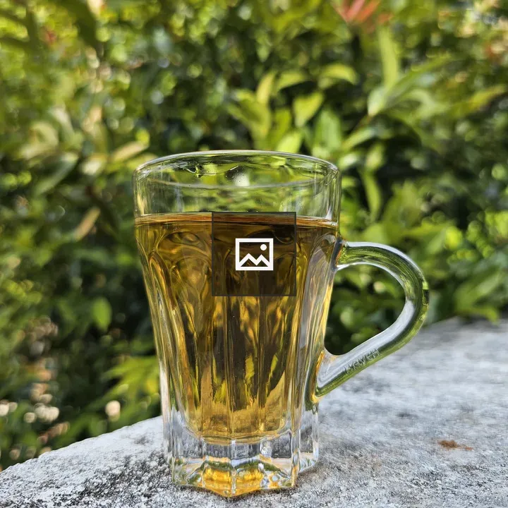 Glass of tea on concrete