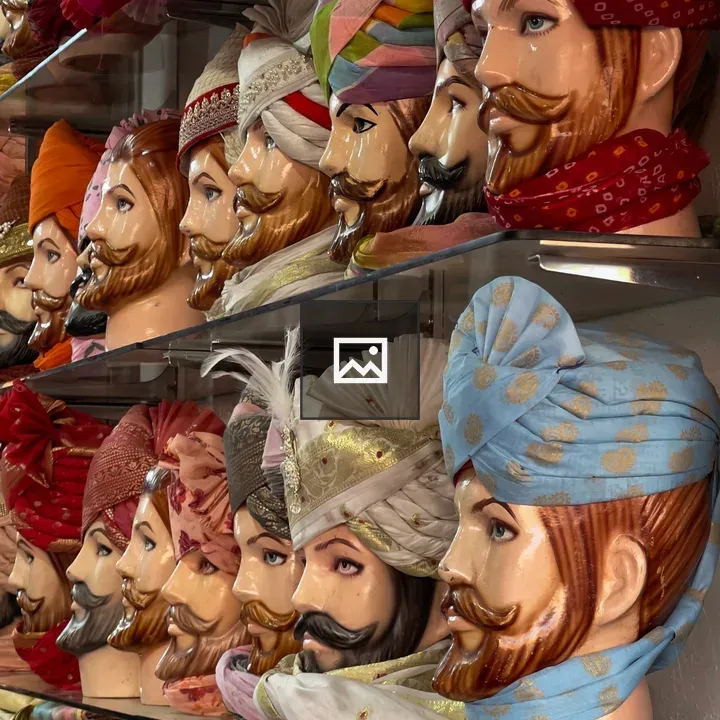 Shelf of Turbaned Mannequin Heads