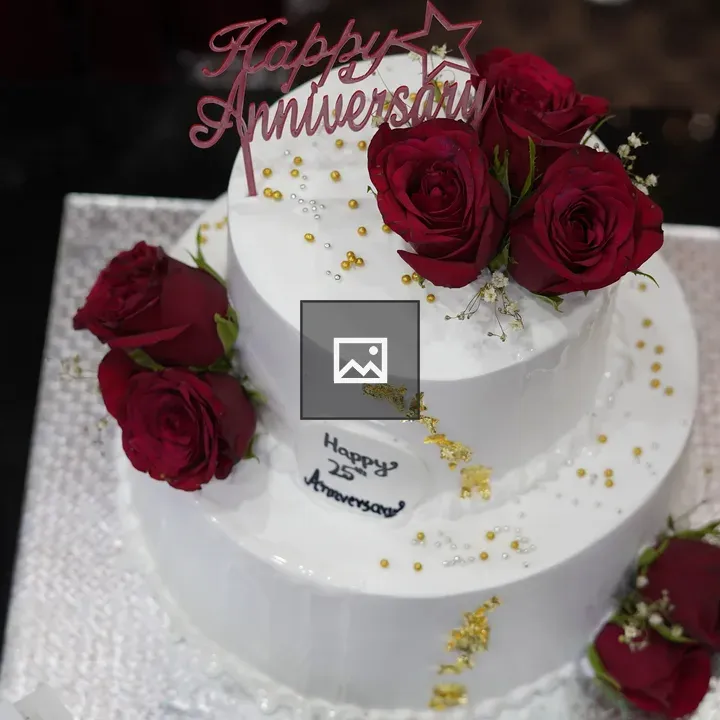 Anniversary cake with red roses