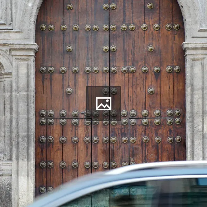 Car by church door