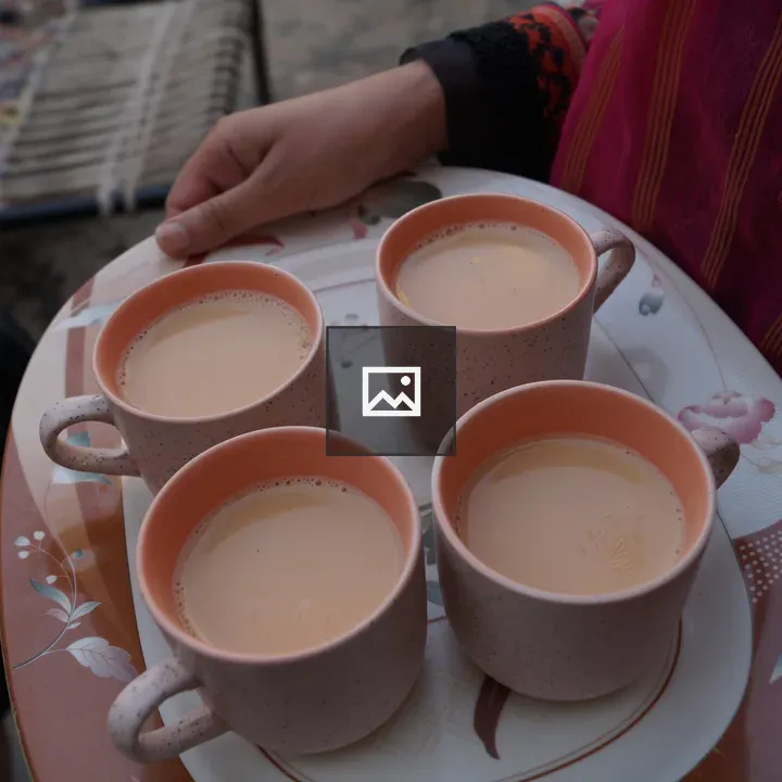 Person with Tea Tray