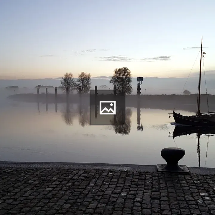 Misty quay on IJssel at Doesburg
