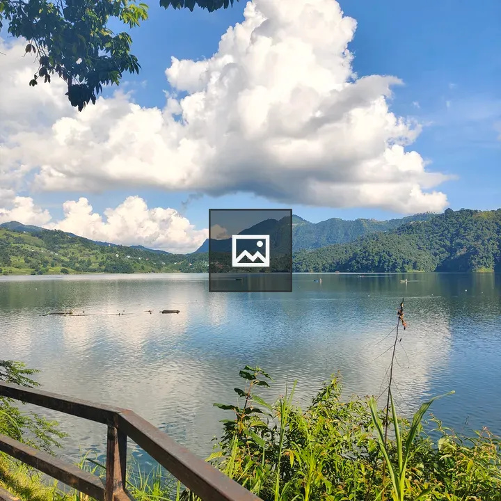 Lakeside Landscape with Clouds