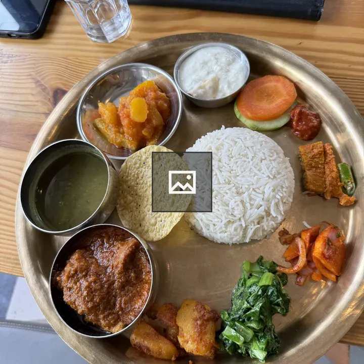 Round brass plate with assorted dishes