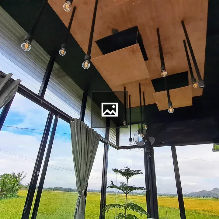 Ceiling chandelier over rice paddy scene