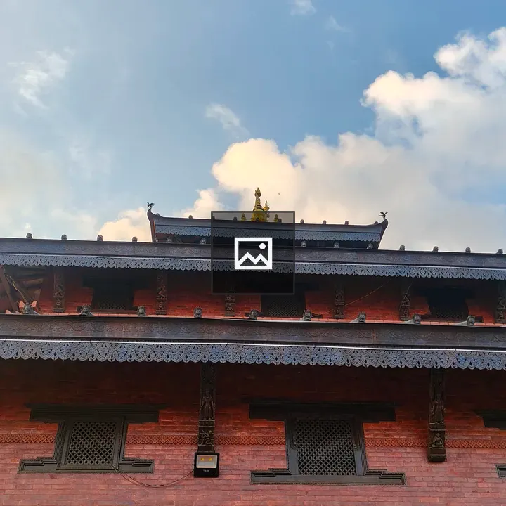Red brick temple with carvings